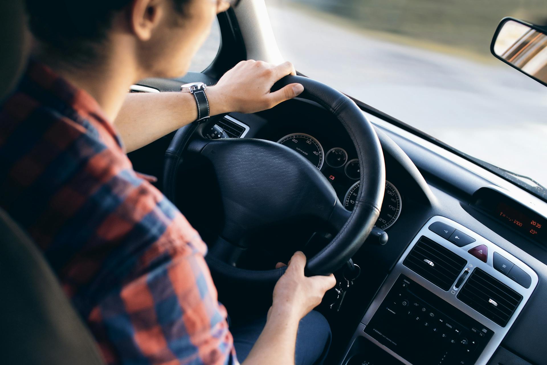 A boy behind the wheel